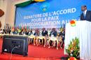 Malian Foreign Affairs Minister Abdoulaye Diop (R) delivers a speech during a ceremony to sign a peace accord between Mali's government and several armed groups on May 15, 2015 in Bamako