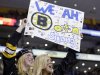 Fans hold up a sign during the second period of an NHL hockey game between the Boston Bruins and the Buffalo Sabres in Boston Wednesday, April 17, 2013. (AP Photo/Elise Amendola)