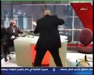  اشتباك بالأيدي على الهواء في قناة الجزيرة -----jpg_101940