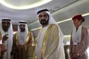 United Arab Emirates' Prime Minister and Ruler of Dubai Sheikh Mohammed takes a tour inside an Airbus A380 aircraft during the Dubai Airshow