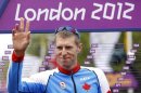 Canada's Ryder Hesjedal gestures at the start of the men's cycling road race at the London 2012 Olympic Games