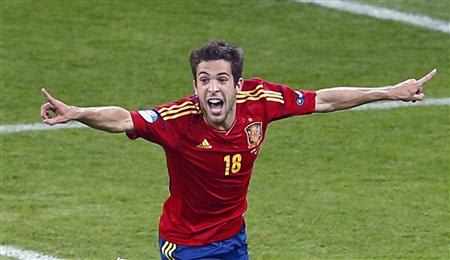 Spain's Alba celebrates his goal against Italy during their Euro 2012 final soccer match at the Olympic Stadium in Kiev