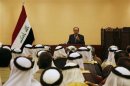 Iraq's Prime Minister Nuri al-Maliki speaks during a meeting with tribal leaders in Mosul