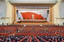 KCNA picture shows attendees at a central report meeting to celebrate the 101st birth anniversary of North Korean founder Kim Il-Sung, in Pyongyang