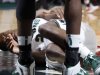 Michigan State's Branden Dawson lies on the court after going down with an injured left knee during the first half of an NCAA college basketball game against Ohio State, Sunday, March 4, 2012, in East Lansing, Mich. Ohio State won 72-70. (AP Photo/Al Goldis)