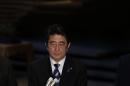 Japan's PM Abe speaks to the media at his official residence in Tokyo