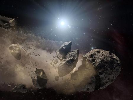 Image courtesy of NASA shows an artist's concept of a broken-up asteroid. Scientists think that a giant asteroid, which broke up long ago in the main asteroid belt between Mars and Jupiter, eventually made its way to Earth and led to the extinction of the dinosaurs. REUTERS/NASA/JPL-Caltech/Handout