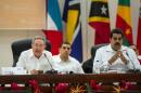 Cuban President Raul Castro (L) and his Venezuelan counterpart Nicolas Maduro (R) attend the special ALBA Summit about Ebola in Havana, on October 20, 2014