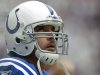 Indianapolis Colts quarterback Kerry Collins looks at the scoreboard in the first quarter of an NFL football game against the Houston Texans, Sunday, Sept. 11, 2011, in Houston. (AP Photo/David J. Phillip)