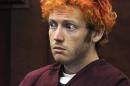 FILE - In this July 23, 2012, file photo, James Holmes, who is charged with killing 12 moviegoers and wounding 70 more in a shooting spree in a crowded theatre in 2012, sits in Arapahoe County District Court in Centennial, Colo. Jurors in the Colorado theater shooting trial reached a decision Monday, Aug. 3, 2015, on whether to keep the death penalty as an option for Holmes. The jury deliberated for less than three hours, starting Thursday after Holmes' parents made an emotional plea for their son's life because he is mentally ill. (RJ Sangosti/The Denver Post via AP, Pool, File)