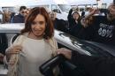 FILE - In this April 11, 2016 file photo, Argentina's former President Cristina Fernandez arrives at the airport in El Calafate, Argentina, as she travels to the capital to face questions about her government's handling of the futures dollar market. A judge in Argentina is charging Fernandez with defrauding the State as part of her government's handling of the futures dollar market. Federal judge Claudio Bonadio said Friday, May 13, 2016 that a scheme to keep the Argentine peso inflated by selling derivatives below market value would not have been possible without Fernandez's approval. The crime is punished with 5 to20 years in prison. (AP Photo/Francisco Munoz, File)