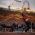 In light from the setting sun, Tunisia's Mohamed Ali Krid makes a throw in the men's javelin F34 category event during the athletics competition at the 2012 Paralympics, Saturday, Sept. 1, 2012, in London.  (AP Photo/Matt Dunham)