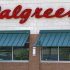 This Friday, June 21, 2013 photo shows the script "Walgreens" over windows at the store in Wexford, Pa. Walgreen Co. reports quarterly financial results, Tuesday, June 25, 2013. (AP Photo/Keith Srakocic)