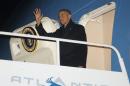 President Barack Obama waves during his arrival on Air Force One at Philadelphia International Airport, Thursday, Jan. 29, 2015, in Philadelphia. Obama traveled to Philadelphia and speak at the House Democratic Issues Conference. (AP Photo/Pablo Martinez Monsivais)