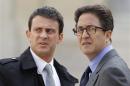 File picture Manuel Valls, France's current Prime Minister, and Aquilino Morelle, French politician and former person in charge of the presidential program, arriving at the Elysee Palace in Paris