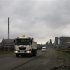 File photo of trucks leaving an AMPLATS processing plant near Rustenburg