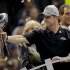 Baltimore Ravens head coach John Harbaugh holds out the Vince Lombardi Trophy as owner Stephen J. Bisciotti, right, stands by after defeating the San Francisco 49ers 34-31 in the NFL Super Bowl XLVII football game, Sunday, Feb. 3, 2013, in New Orleans. (AP Photo/Marcio Sanchez)