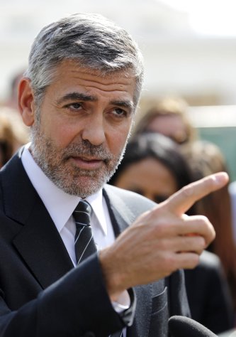 Actor George Clooney speaks to reporters outside the White House in Washington, Thursday, March 15, 2012, after a meeting with President Barack Obama. (AP Photo/Pablo Martinez Monsivais)