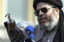 File photograph shows Muslim cleric, Abu Hamza al-Masri, addressing the sixth annual rally for Islam in Trafalgar Square, London