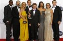 The cast of "Homeland" pose after the series won the Emmy award for outstanding drama series at the 64th Primetime Emmy Awards in Los Angeles