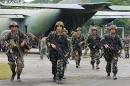 US-trained Philippine Army troops arrive in Jolo island for deployment against Abu Sayyaf rebels on August 24, 2002, as part of a government campaign that over decades has weakened but not eliminated the movement