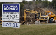<p>               In this Thursday, Dec. 20, 2012 photo, a sign hangs in North Andover, Mass., where a house is under construction. Sales of new U.S. homes cooled off in December compared with November, but sales for the entire year were the best since 2009. The Commerce Department said Friday, Jan. 25, 2013, that new-home sales fell 7.3 percent last month to a seasonally adjusted annual rate of 369,000. That's down from November's rate, which was the fastest in 2 ½ years. (AP Photo/Elise Amendola)