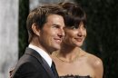 Actor Cruise and his wife, actress Holmes, arrive at 2012 Vanity Fair Oscar party in West Hollywood