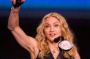 Madonna Tetap Pede Pamer Tubuh
