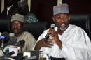 Chairman of the Independent National Electoral Commission Attahiru Jega (R) speaks on February 7, 2015 in Abuja, Nigeria