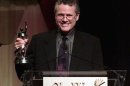 SCREENWRITER WILLIAM BROYLES JR ACCEPTS AWARDS AT SHOWEST CEREMONY.
