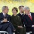 Former President George W. Bush speaks to former President Bill Clinton as former first lady Laura Bush looks on after taking the stage at the dedication of phase 1 of the permanent Flight 93 National Memorial near the crash site of Flight 93 in Shanksville, Pa. Saturday Sept. 10, 2011.  (AP Photo/Amy Sancetta)
