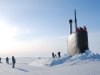 In this March 19, 2011 photo released by the U.S. Navy, crew members look out from the USS Connecticut, a Sea Wolf-class nuclear submarine, after it surfaced through ice in the Arctic Ocean. The U.S. and other countries are building up their military presence in the Arctic to help exploit its riches - and protect shifting borders.  (AP Photo/U.S. Navy, Cmdr. Christy Hagen)