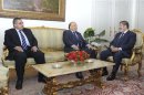 The Muslim Brotherhood's President-elect Mursi meets with al-Katatni, speaker of Egyptian parliament and senior member of Muslim Brotherhood and Fahmy, speaker of Shura Council at presidential palace in Cairo
