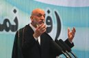 Afghanistan's President Karzai speaks during a celebration for World Environment Day in Kabul