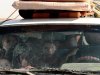 A family fleeing is seen inside a car loaded with their belongings at a checkpoint 99 miles (160 kilometers) from Sirte, Libya, Sunday, Aug. 28, 2011. Mohammed al-Rajali, a spokesman, said rebel forces captured Bin Jawwad, about 350 miles (560 kilometers) east of Tripoli, late Saturday and deployed forces in the city after days of fighting. He said Gadhafi's forces fled westward, and are likely to join regime forces in Sirte, the headquarters of Gadhafi's tribe and his last major bastion of support. Sirte has been heavily targeted by NATO airstrikes. (AP Photo/Gaia Anderson)