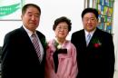 This undated photo released by FreeKenNow.com on October 12, 2013, shows Kenneth Bae with his parents, Myunghee Bae (C) and Sung Seo Bae (L) at an undisclosed location