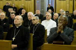 Pope Francis is shown on retreat with members of the …