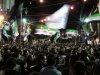Syrians wave revolutionary flags and chant slogans at a night protest against President Bashar Assad in a neighborhood of Damascus, Syria, Monday, April 2, 2012. (AP Photo)