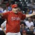 Los Angeles Angels manager Mike Scioscia questions the umpires on a Houston Astros pitching change in the seventh inning of a baseball game Thursday, May 9, 2013, in Houston. (AP Photo/Pat Sullivan)