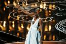 Nyong'o, best supporting actress winner for her role in "12 Years a Slave", speaks on stage at the 86th Academy Awards in Hollywood