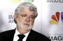 FILE - In this Feb. 17, 2012 file photo, George Lucas arrives at the 43rd NAACP Image Awards in Los Angeles. A decade after George Lucas said "Star Wars" was finished on the big screen, a new trilogy is destined for theaters after The Walt Disney Co. announced Tuesday, Oct. 30, 2012, that it was buying Lucasfilm Ltd. for $4.05 billion. (AP Photo/Matt Sayles File)