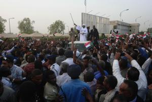 Sudanese President Omar al-Bashir raises his stick&nbsp;&hellip;