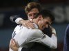 Tottenham Hotspur's Gareth Bale embraces manager Andre Villas-Boas after beating West Ham United in their English Premier League soccer match at Upton Park stadium in east London
