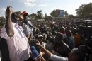 Kenya's PM Odinga addresses his supporters during a political rally at the Kibera in the capital Nairobi