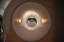 A cancer patient looks into the tube of a MRI scanner at a hospital in Washington May 23, 2007.