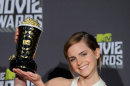 Emma Watson poses with the Trailblazer award backstage at the MTV Movie Awards (Chris Pizzello/Invision /AP)