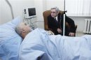 Armenia's President Sarksyan visits injured Presidential candidate Hayrikyan at the hospital in Yerevan