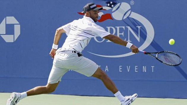 James Blake of the U.S. lunges for a return against Lukas Lacko of Slovakia at the US Open (Reuters)