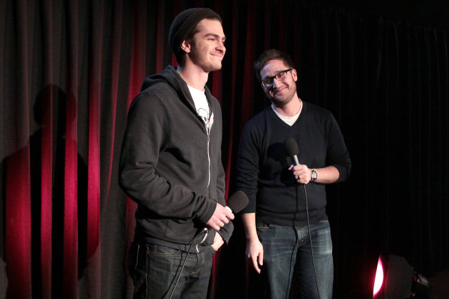 Actor Andrew Garfield, left, and MTV personality Josh Horowitz appear at the debut of the 3-D full-length "Amazing Spider-Man" trailer at Regal Union Square on Monday, Feb. 6, 2012 in New York. The event was simulcast at movie theaters in 13 cities spanning the globe, including Mexico City, Berlin, Rome, Paris and Moscow, with the cast and filmmakers appearing in Los Angeles, New York, Rio de Janeiro and London. The film will hit theaters on July 3. (AP Photo/Starpix, Dave Allocca)