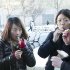 In this Monday, Jan. 23, 2012 still photo taken from video, students try free samples of AeroShot, an inhalable caffeine packed in a lipstick-sized canister, on the campus of Northeastern University in Boston. Harvard University engineering professor David Edwards, created AeroShot, which went on the market in late January. (AP Photo/Rodrique Ngowi)